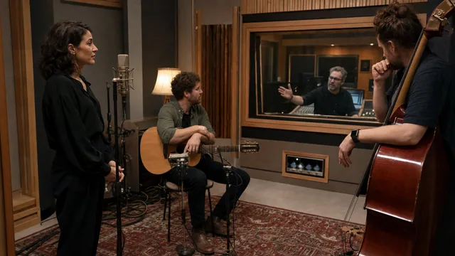 Small ensemble pausing between takes in a professional recording studio